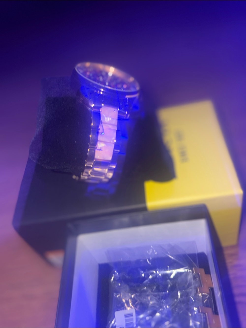 Invicta Silver, Gold, and Diamond Women watch.